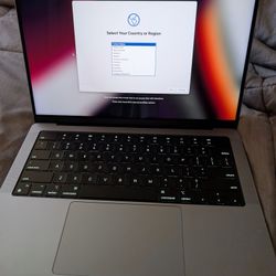 2021 Apple MacBook Pro 14" is a laptop with an M1 Pro chip