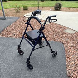 Walker With Seat And Storage Underneath 