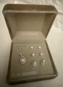 Cubic Zirconia Jewelry Set Brand new with box Fine silver plated necklace and earrings set.