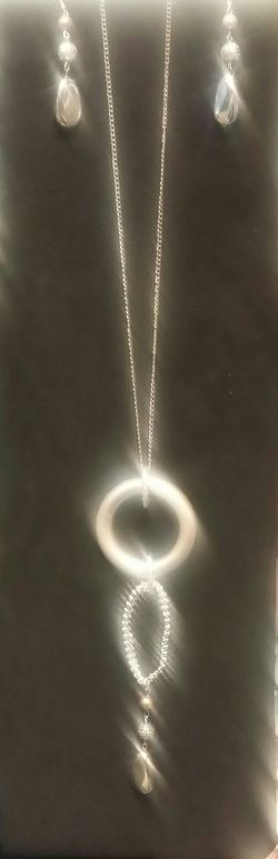 Long silver large ring necklace