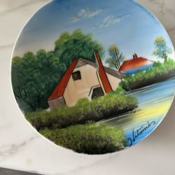 Hand painted houseboat on the water