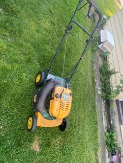 Lawn mower weed trimmer