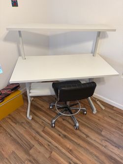 White desk and black chair
