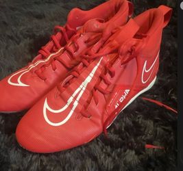 Red Nike cleats size 10