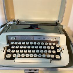 Royal Sabre Portable Typewriter w/manuals 