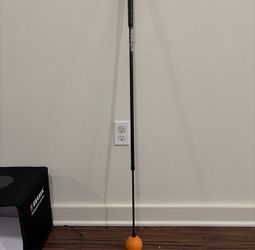 ORANGE WHIP TRAINER – GOLF SWING TRAINING AID