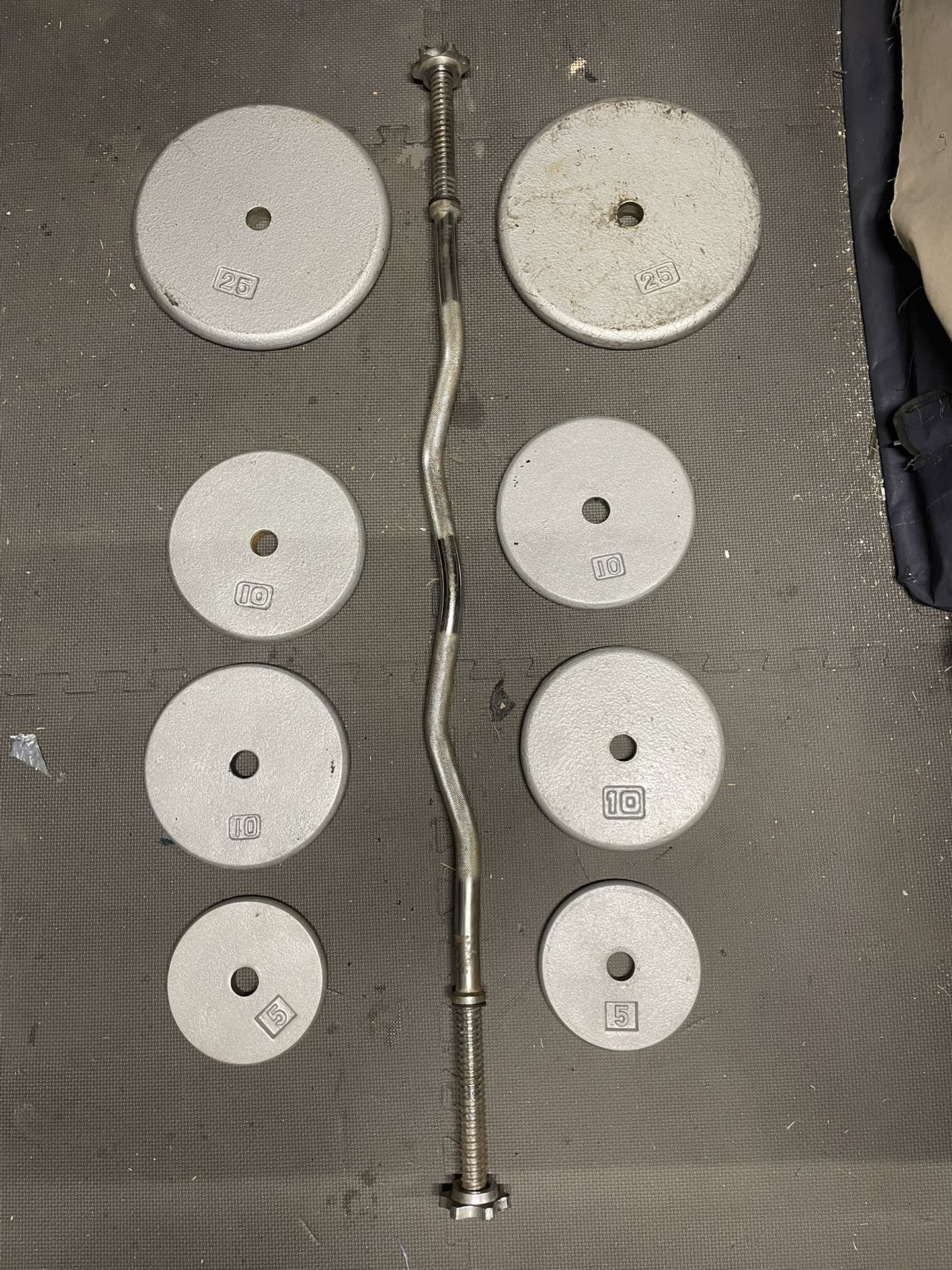 Weights Plates / Curl Bar. 90 Dollars