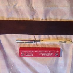 Vintage Henckels straight razor & strop