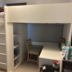 Ikea White twin bed frame with desk, closet, shelves, and ladder built in