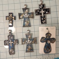 9 Large Cross Pendents.