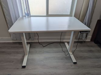 Dual motor standing desk frame