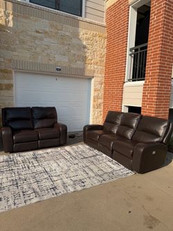Brown leather reclining couch set