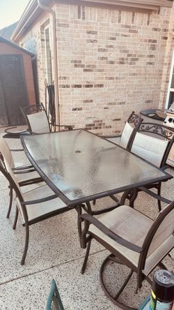 Large glass top table and 6 chairs