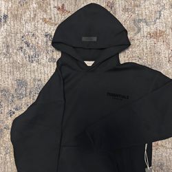 Black essential fear of god hoodie 