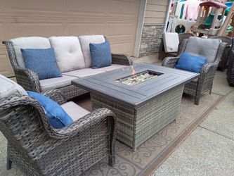 Outdoor wicker furniture with large fire pit