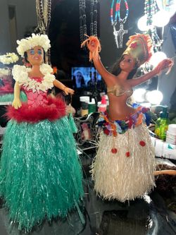 Vintage Hawaiian musical dolls