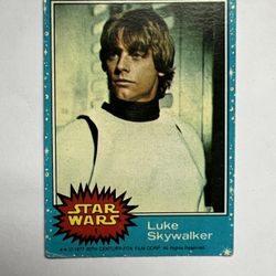 The 1977 Topps Star Wars Blue Series 1 Card #1 featuring Luke Skywalker