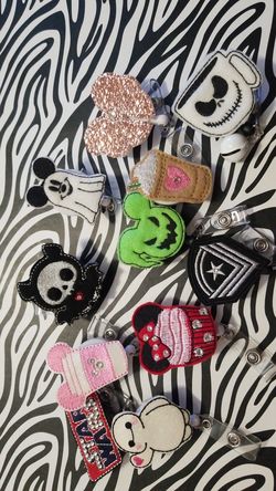 Reel name badge holder