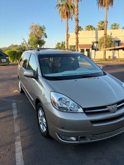 2004 Toyota Sienna XLE Limited 7 passenger minivan with 58,000 miles second owner.