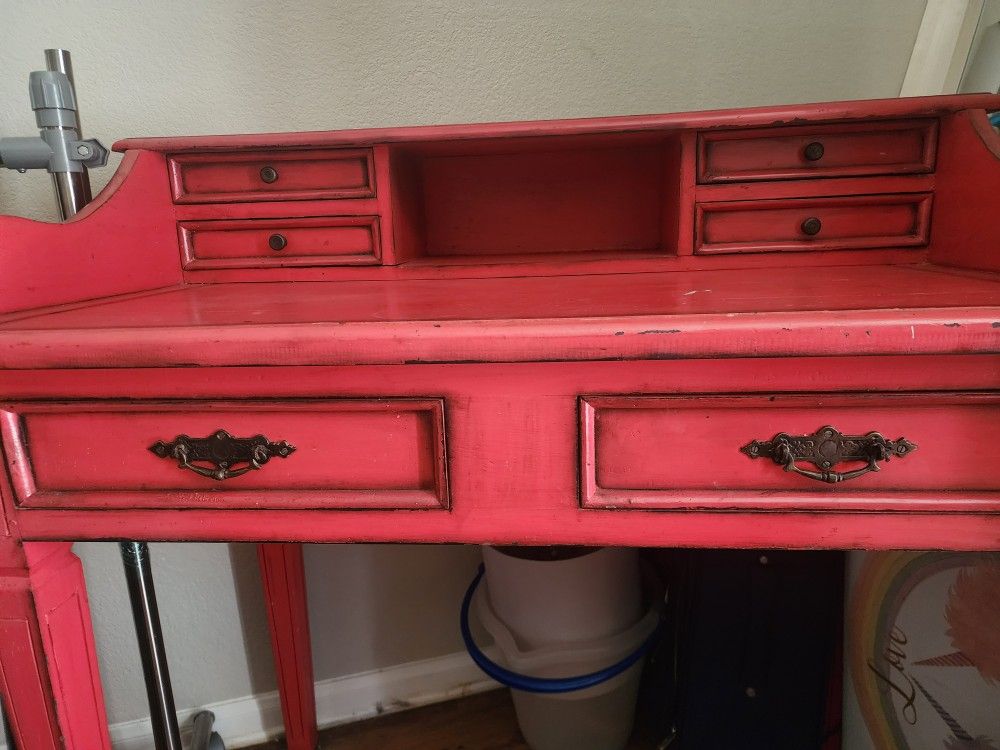 Antique red writing desk