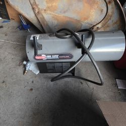 120000-150000 BTU Dyna Glo Delux heater.
