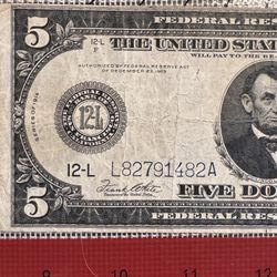 This is a 1914 Series $5 Federal Reserve Note.