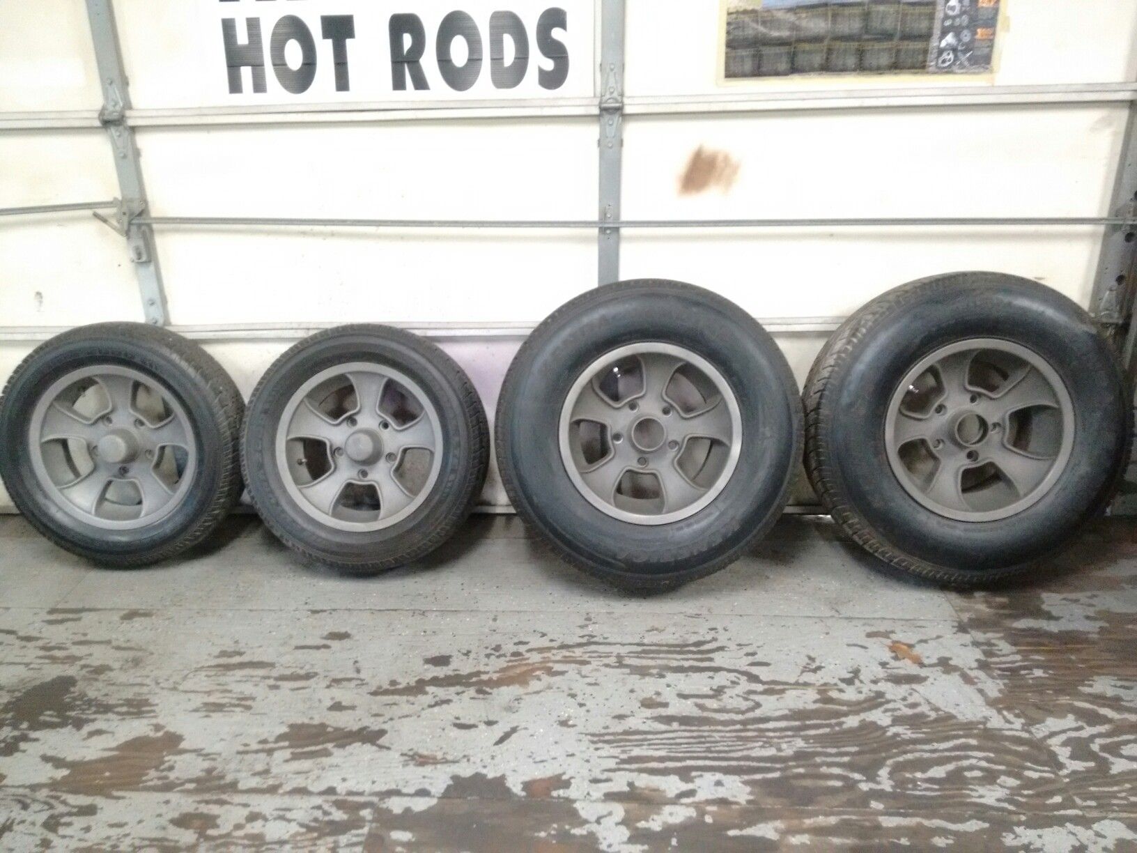 Rocket injector wheels and tires big and little 6" front 8" rear 5 1/2 Ford bolt pattern new tires 15" call {contact info removed}