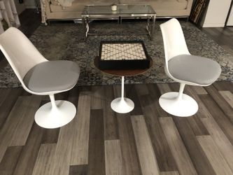 Two chairs and coffee table.