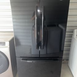 Black Whirlpool Refrigerator And Freezer