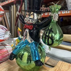 Monopoly Man Sitting On Bag Of Money Art Piece 