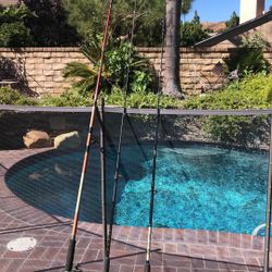 THREE (3) 7'-9' Fishing Rods with Spinning Reels-GOOD for Pier,Breakwater and Surf.Rods Rated 10-25 lb