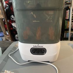 Baby Brezza Bottle Sterilizer and Dryer Advanced – 33% Faster - Largest Capacity Steam Sanitizer - Universal Sterilization Machine for All Bottles + P