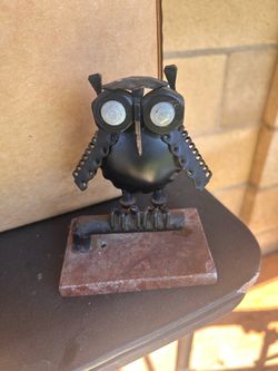 handcrafted scrap metal owl sculpture