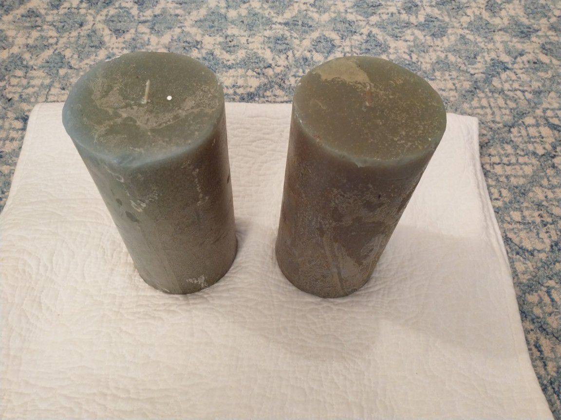 pair of 4" pillar green candles