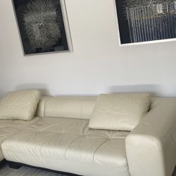 beige  Faux leather couch Excellent condition like new no dog no cats no kids