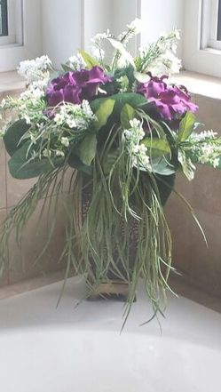 Bronze vase with silk flowers