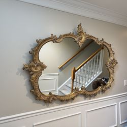 A large gorgeous mirror.
