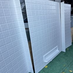 Hi we have this shower walls acrylic heavy duty pure white  Store price $854 this real heavy duty is not vinyl  This fiber glass acrylic material stro