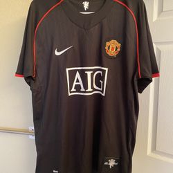 07/08 MAN U RONALDO JERSEY BRAND NEW SIZE LARGE CAN NEGOTIATE PRICE