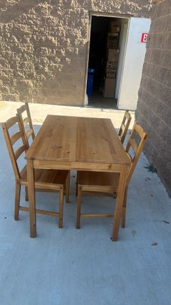 Dinner table with four chairs
