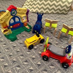 Toddler toys - 2 ride on cars, 2 chairs, bouncy horse, play station