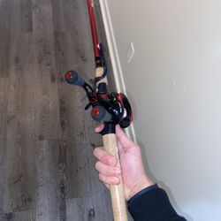 Carbon Fire Lews Bait caster Used Once With Berkeley Cherrywood Rod