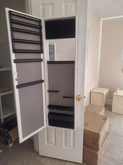 Lockable wall or over the door jewelry armoire with full length mirror