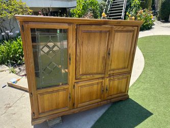 Free! Oak cabinets entertainment center and nightstand