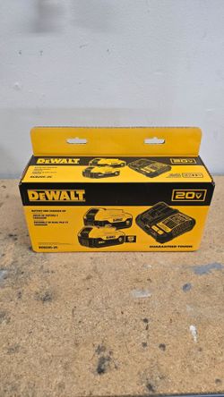 Two Dewalt 5ah batterirs and charger.  New in box