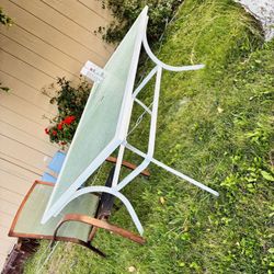 $130-- very sturdy!! Bigger Outside table (no chairs)   Could use a repainting,  (still has streaks on the glass part due to being outside in the weat