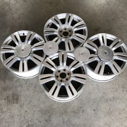 4 factory 18 inch Cadillac rims 6 lugs