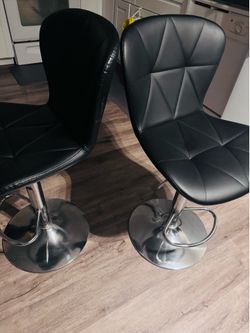 Adjustable black leather bar stools