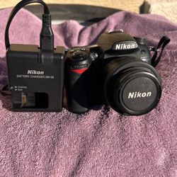 Nikon D7000 SLR Camera w/ Nikon AF-S Nikkor 35mm f/1.8G DX Lens