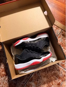 Jordan 11 retro low “bred”